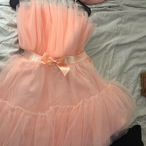 Never worn I had it alter to fit size s-m